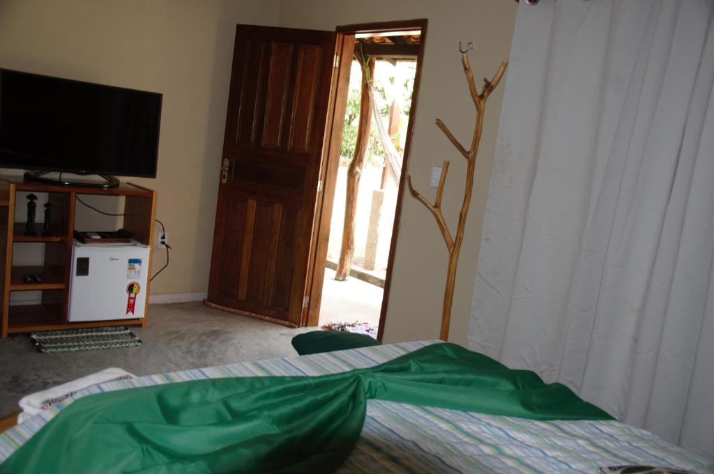 Postel nebo postele na pokoji v ubytování Sítio Vale da Serra