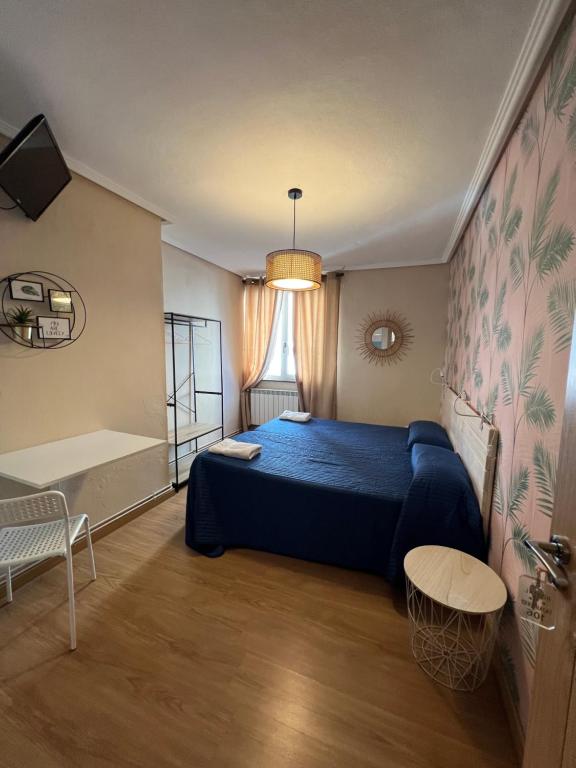 Postel nebo postele na pokoji v ubytování Hosteria Tajahierro