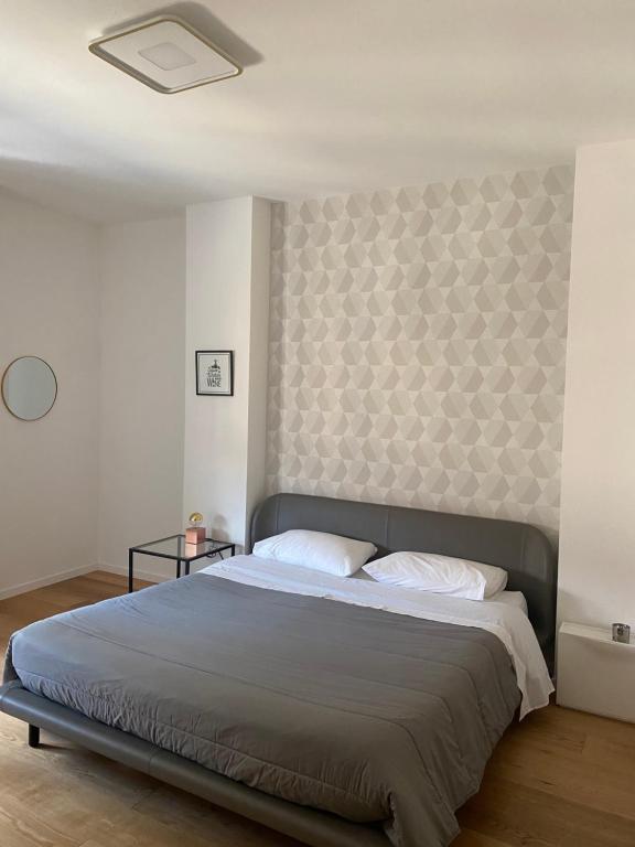 Posteľ alebo postele v izbe v ubytovaní Appartamento di lusso in centro storico Palermo