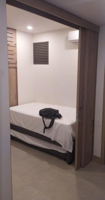 Postel nebo postele na pokoji v ubytování Apto morroszoe 217A