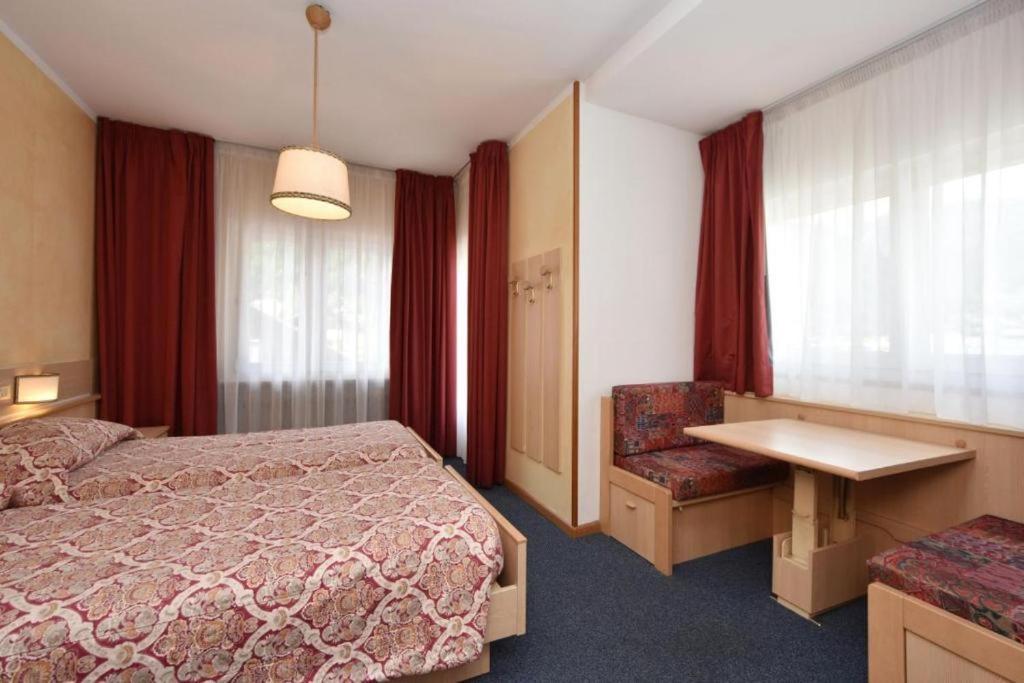 Postel nebo postele na pokoji v ubytování Hotel Bellaria