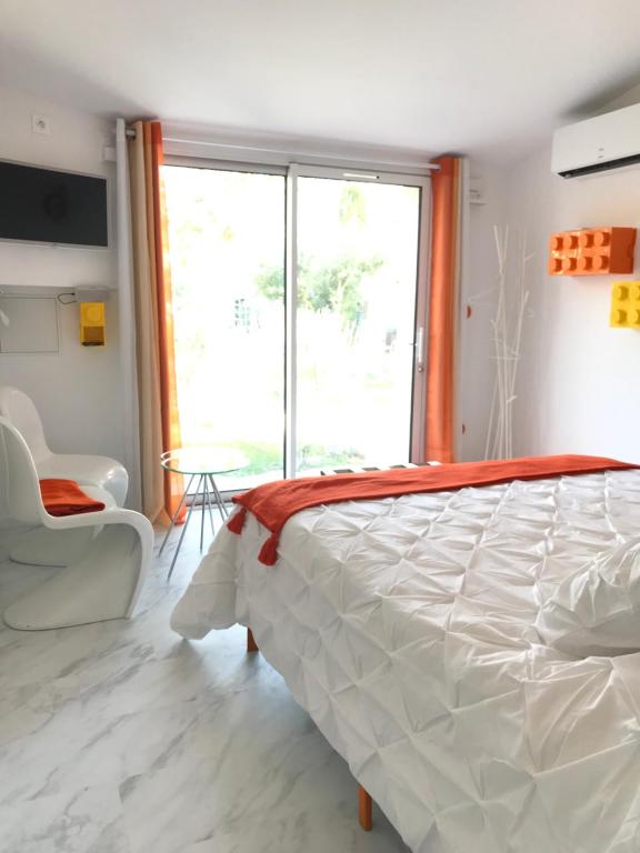 Postel nebo postele na pokoji v ubytování La Maison 1440