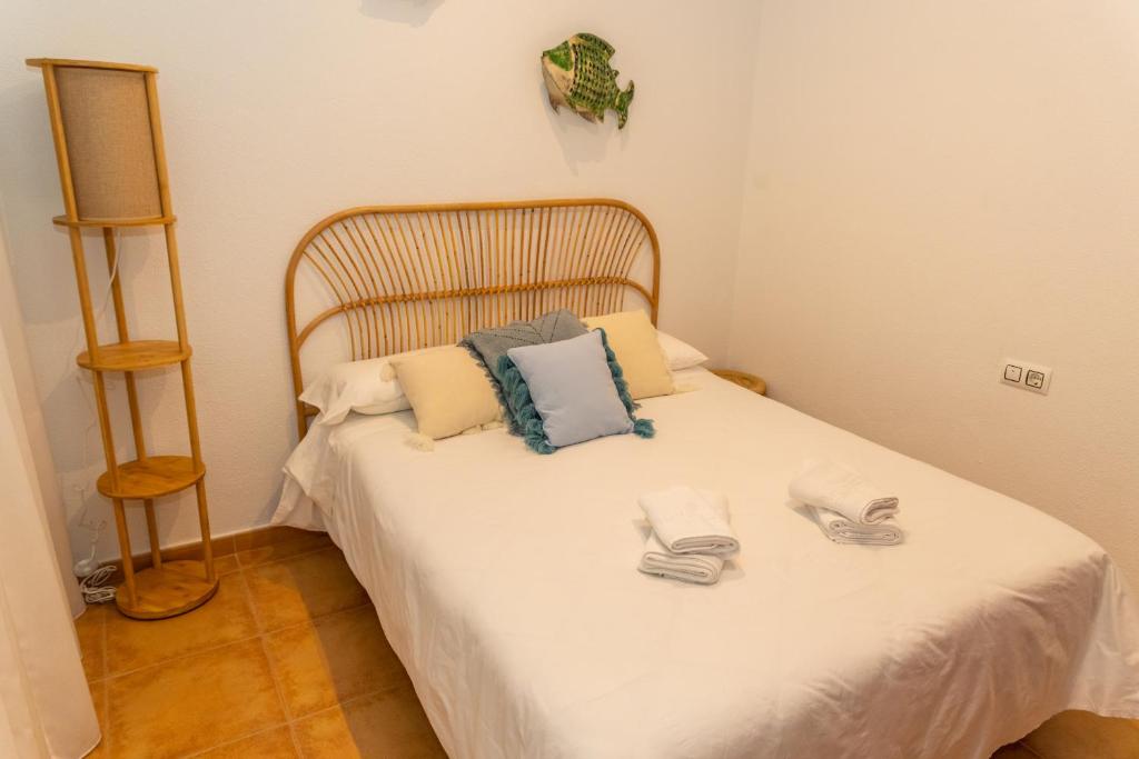Posteľ alebo postele v izbe v ubytovaní Casa El Lance - Patio y Paseo Marítimo