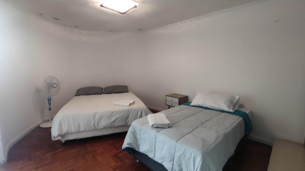 Postel nebo postele na pokoji v ubytování Hotel Flamingo Express