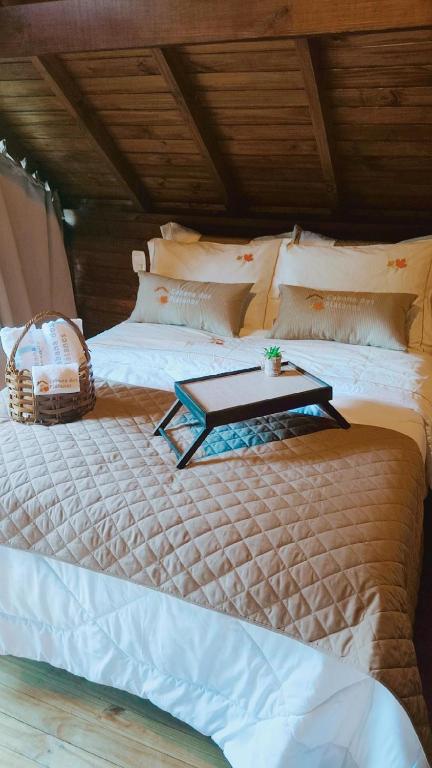 Postel nebo postele na pokoji v ubytování Cabanas dos Plátanos