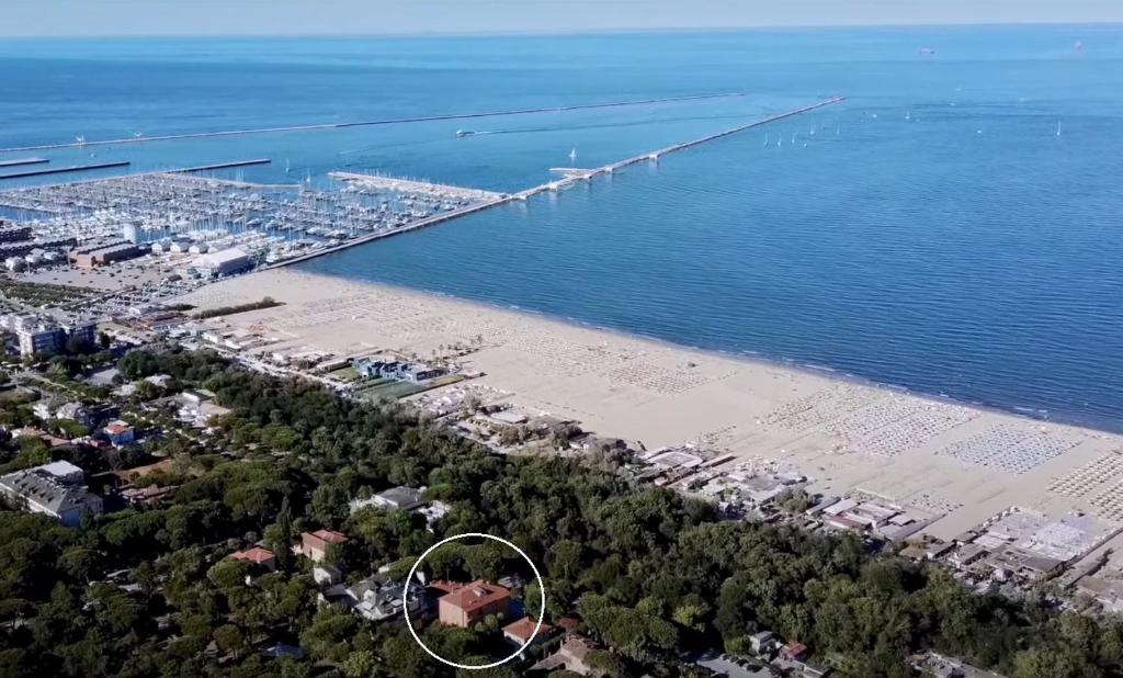 an aerial view of a beach with a pier at Ariston Vacanze in Marina di Ravenna