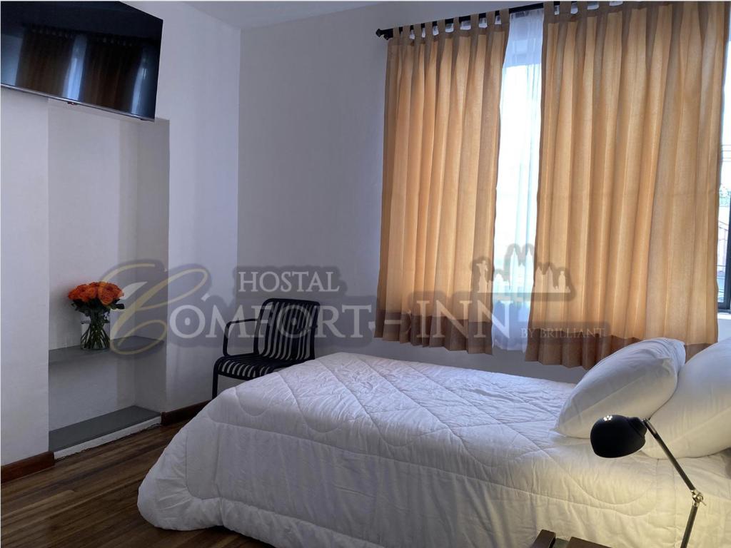 Postel nebo postele na pokoji v ubytování HOTEL COMFORT- Inn