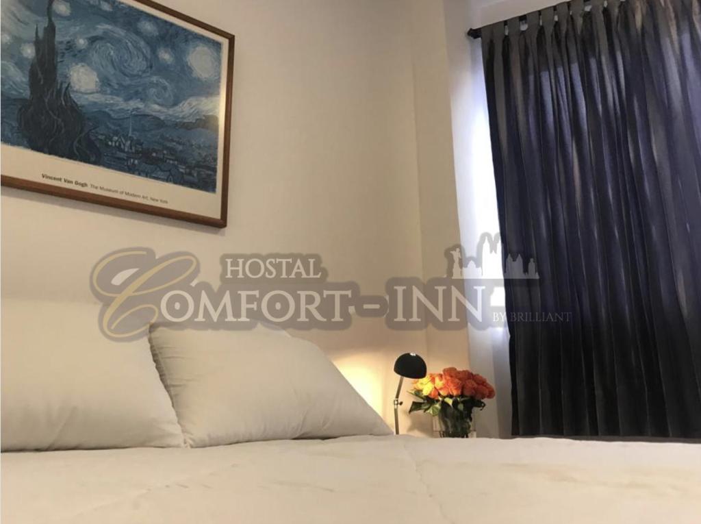 Postel nebo postele na pokoji v ubytování HOTEL COMFORT- Inn