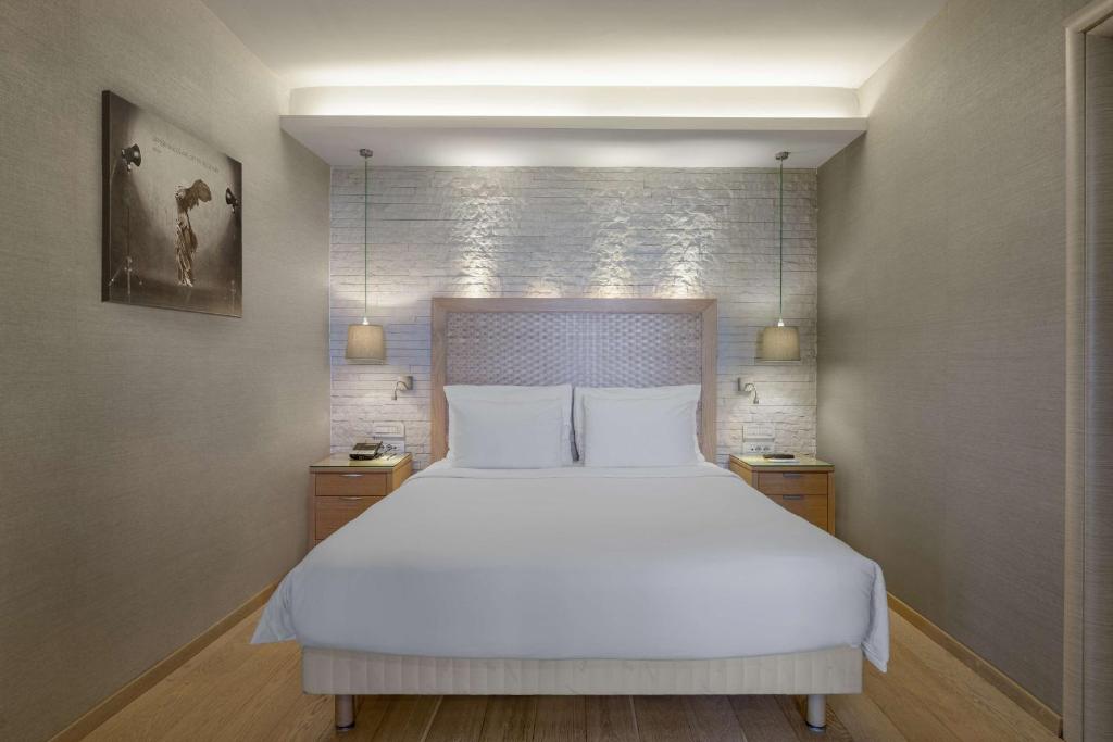 Postel nebo postele na pokoji v ubytování Radisson Blu Park Hotel Athens