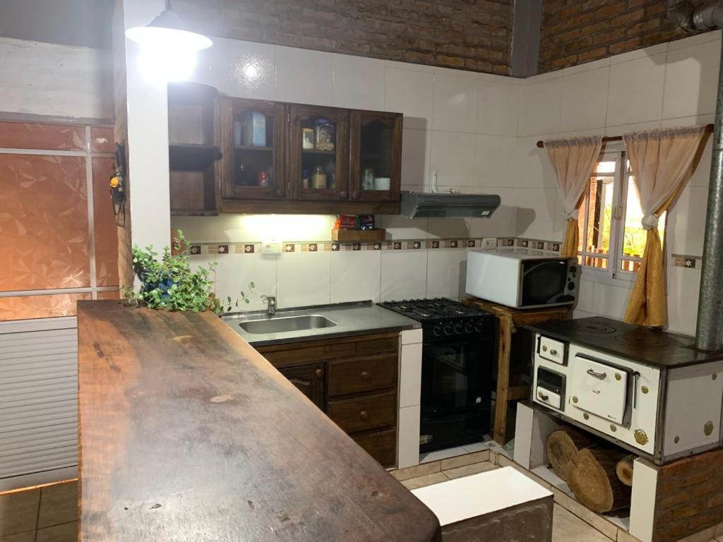 Kuchyň nebo kuchyňský kout v ubytování Hospedaje Las Canelas