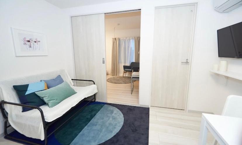 TV a/nebo společenská místnost v ubytování ONE STAGE HOTEL