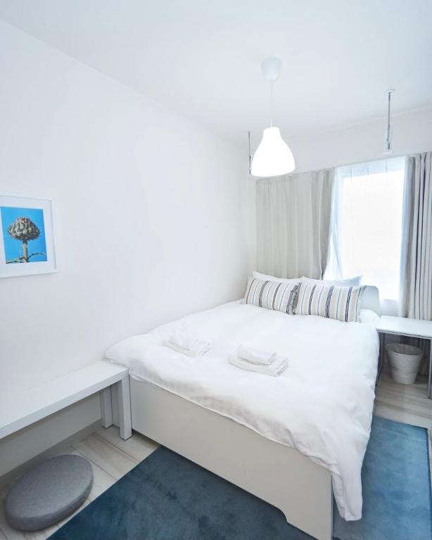 Postel nebo postele na pokoji v ubytování ONE STAGE HOTEL