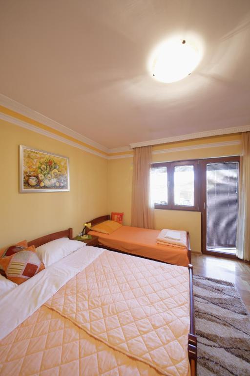 Postel nebo postele na pokoji v ubytování Guest House Pansion 10