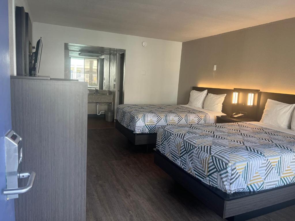 Postel nebo postele na pokoji v ubytování Motel 6 Glendale Phoenix