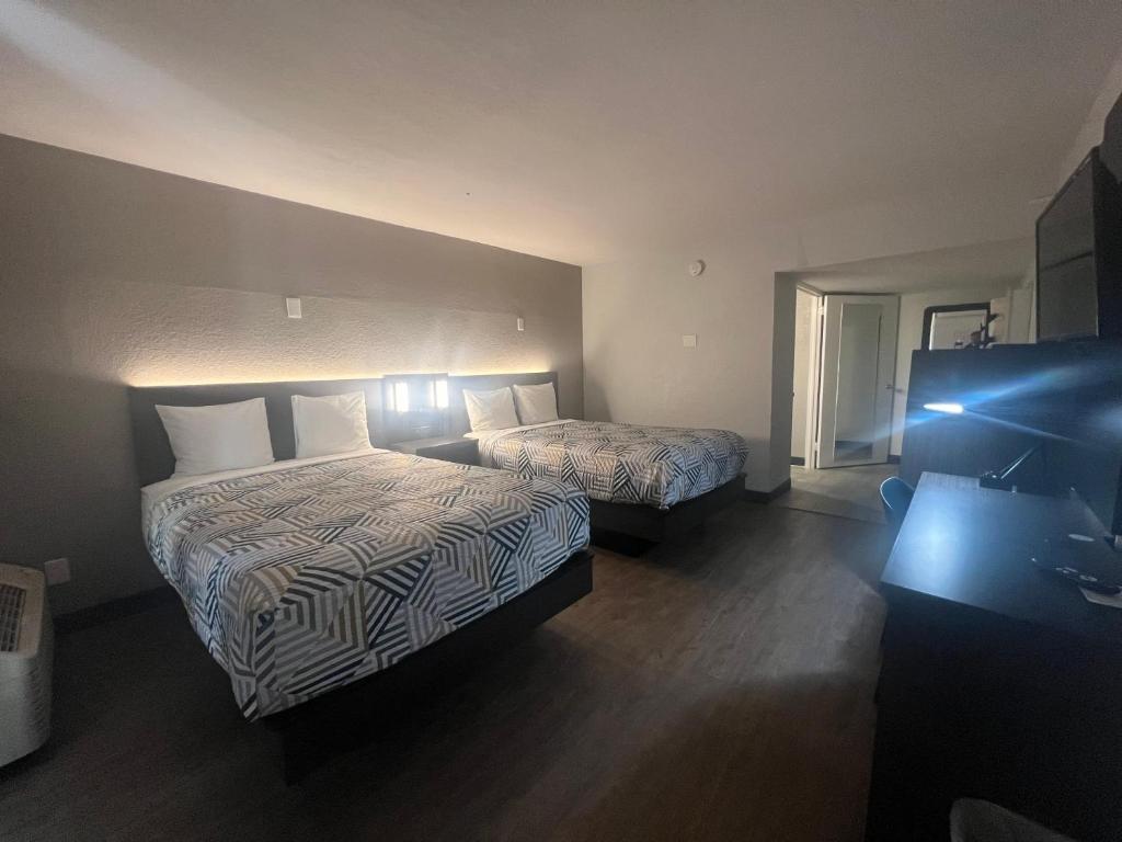 Postel nebo postele na pokoji v ubytování Motel 6 Glendale Phoenix