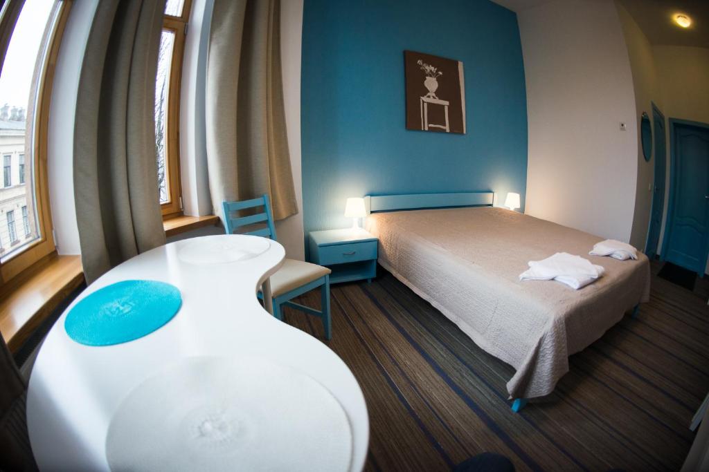 Postel nebo postele na pokoji v ubytování Moja Accommodation