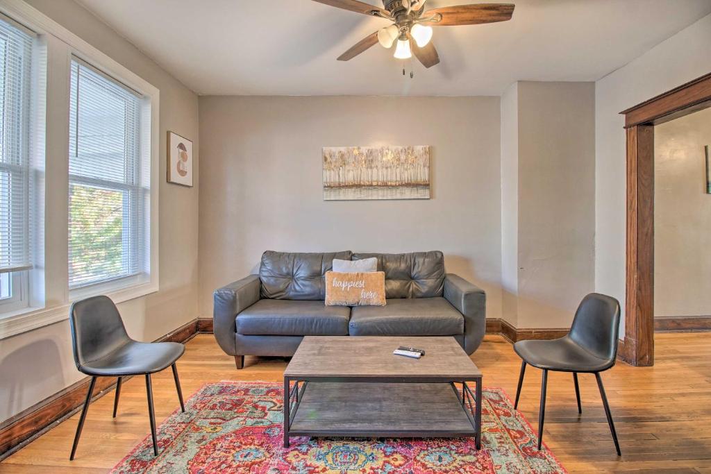 a living room with a couch and two chairs at 4BR+Parking central townhouse walk to metro&shops in Washington, D.C.