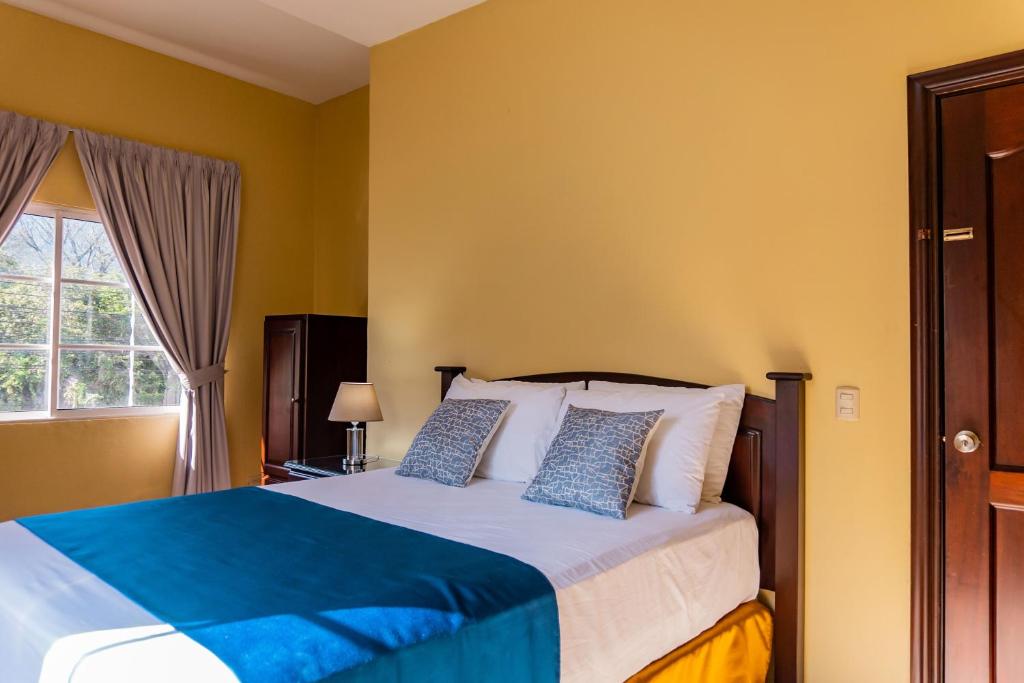 Postel nebo postele na pokoji v ubytování Art Hotel Boutique