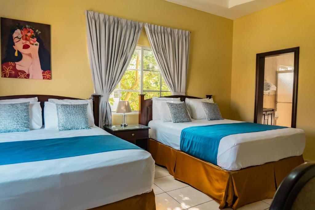 Postel nebo postele na pokoji v ubytování Art Hotel Boutique