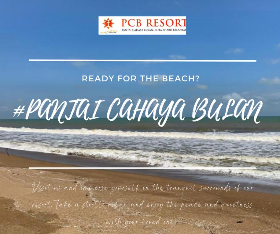 una spiaggia con le parole pronte per la spiaggia di PCB BEACH RESORT a Kota Bharu