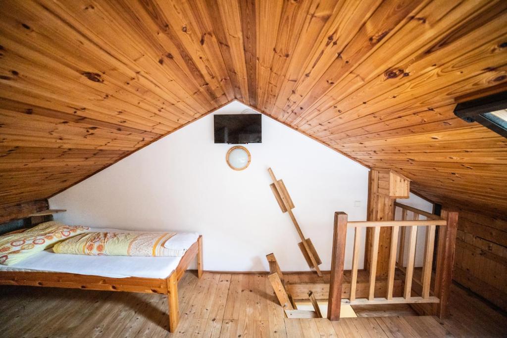 Postel nebo postele na pokoji v ubytování Vinný Sklep U Terezy a Jakuba