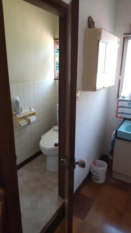 Koupelna v ubytování Guesthouse Oomiya base 大宮基地別荘