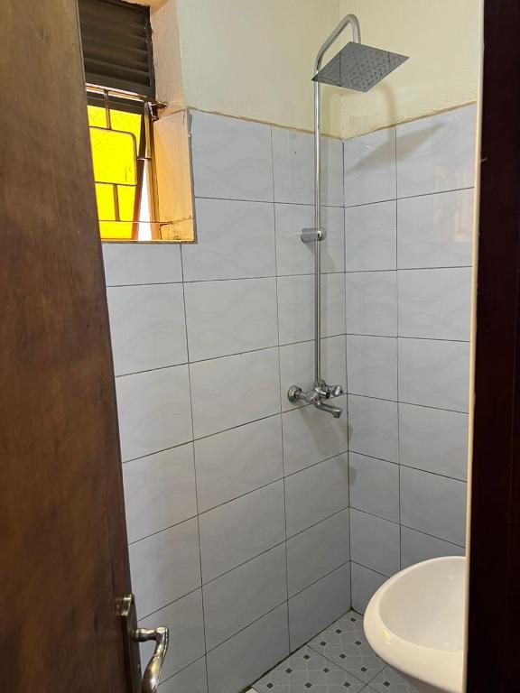 Koupelna v ubytování Pearl suites - Bukoto