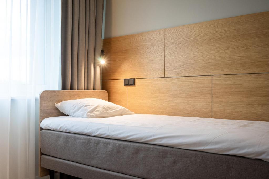 Postel nebo postele na pokoji v ubytování Espak Hostel