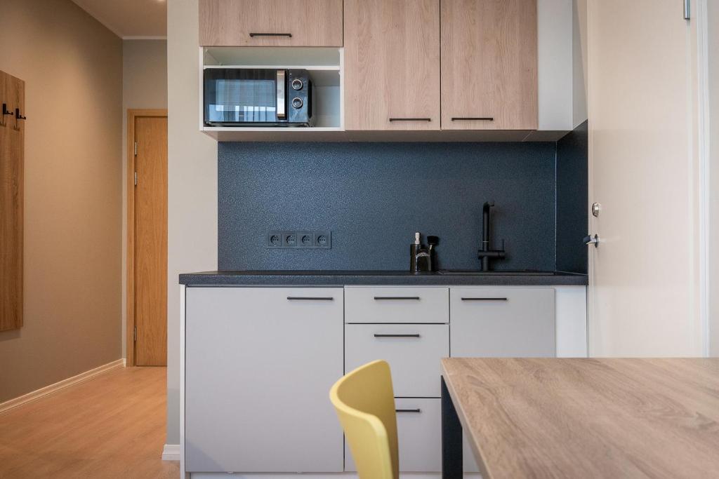 Kuchyň nebo kuchyňský kout v ubytování Espak Hostel