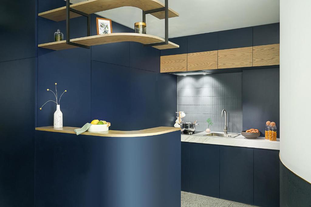 Kuchyň nebo kuchyňský kout v ubytování basePLUS-Shanghai BINJIANG Serviced Apartment