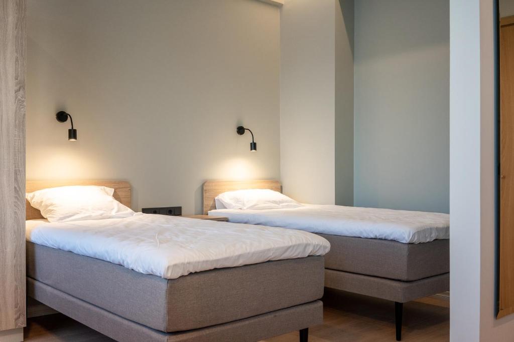 Postel nebo postele na pokoji v ubytování Espak Hostel