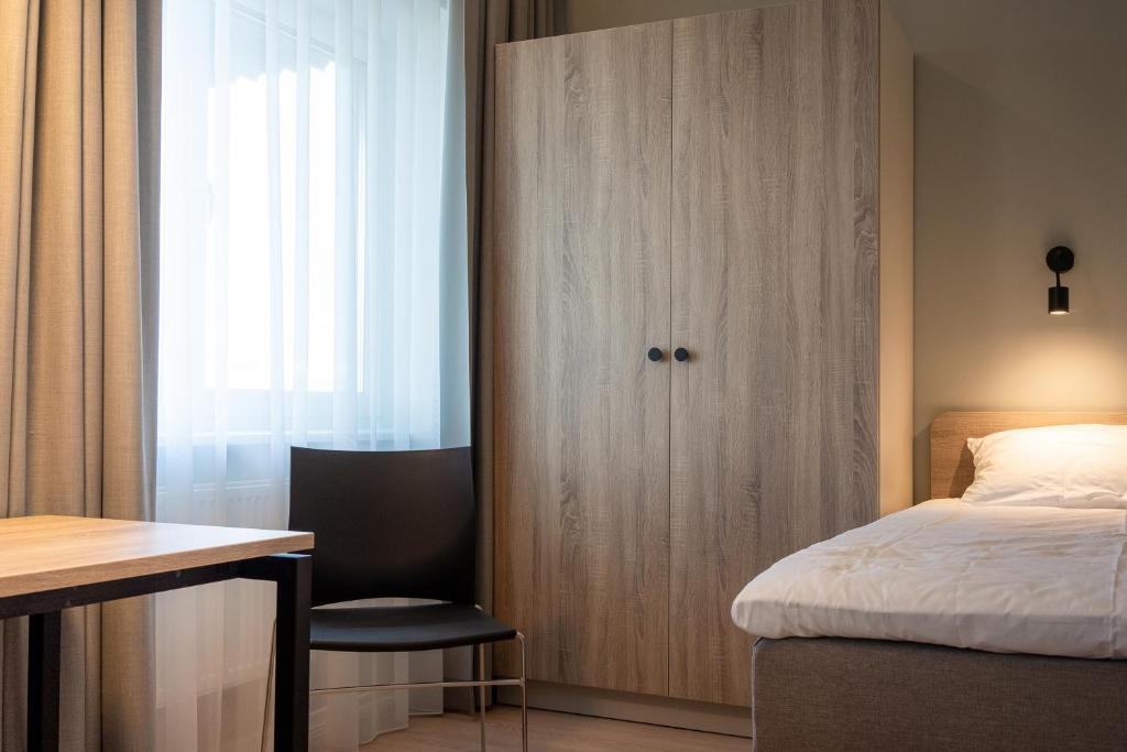 Postel nebo postele na pokoji v ubytování Espak Hostel