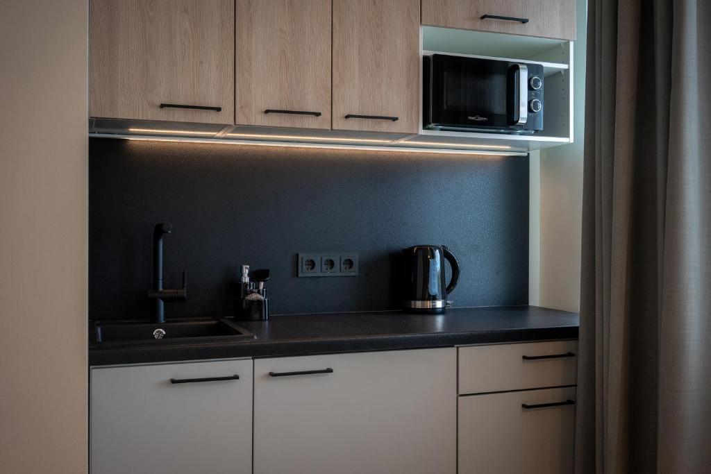 Kuchyň nebo kuchyňský kout v ubytování Espak Hostel