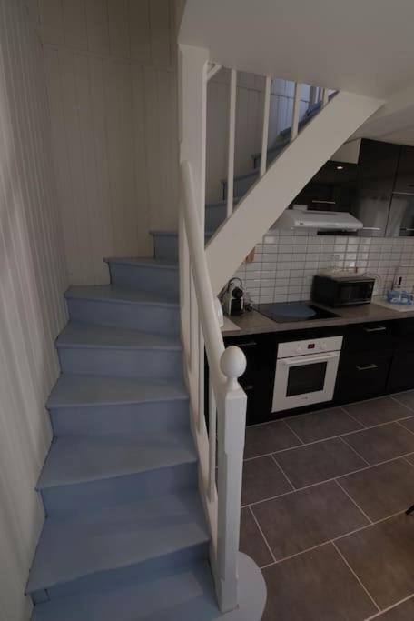 Kuchyňa alebo kuchynka v ubytovaní jolie cottage idéalement située