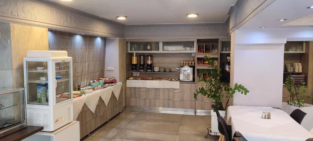 A kitchen or kitchenette at Poseidonio