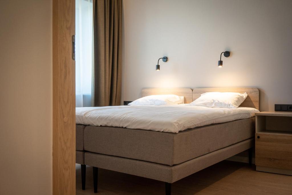 Postel nebo postele na pokoji v ubytování Espak Hostel