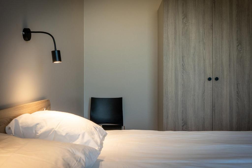 Postel nebo postele na pokoji v ubytování Espak Hostel