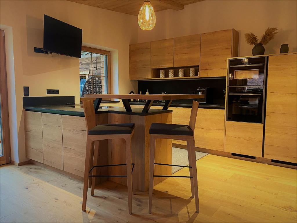 Kuchyň nebo kuchyňský kout v ubytování Chalet Tuxer