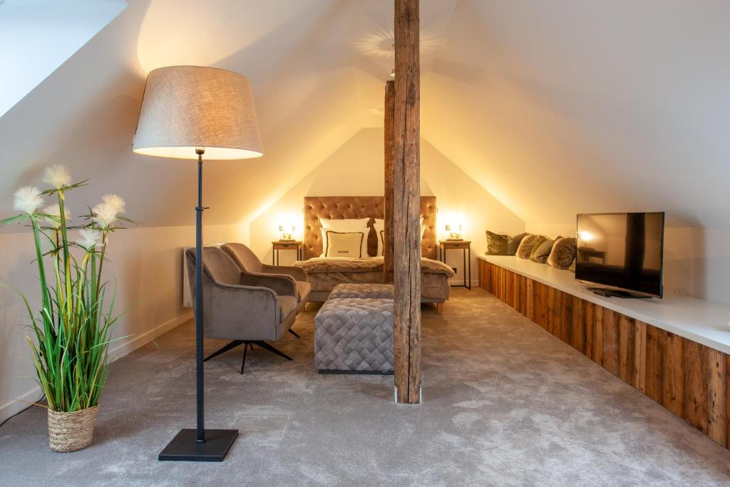 Posezení v ubytování Hotel Achterum Greetsiel