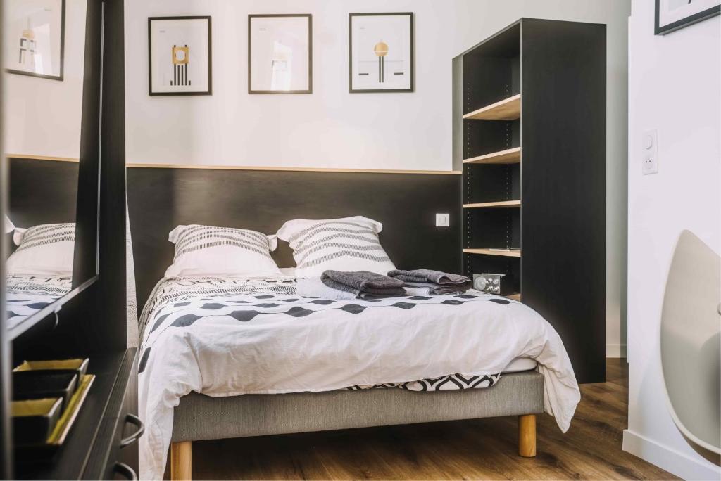 Posteľ alebo postele v izbe v ubytovaní Nouveau studio grand luxe proximité siège Michelin