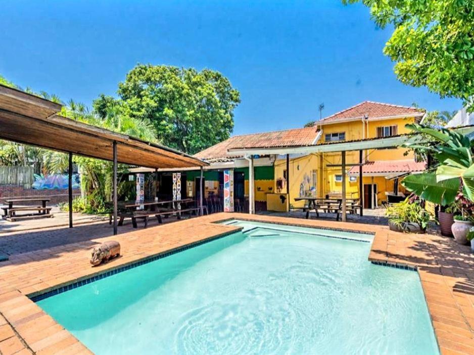 an image of a swimming pool in a house at Tekweni in Durban