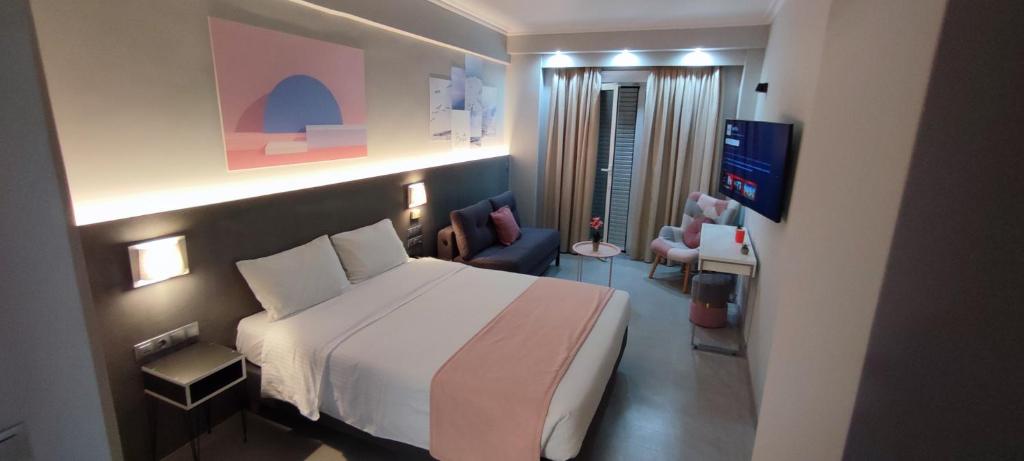 A bed or beds in a room at Poseidonio