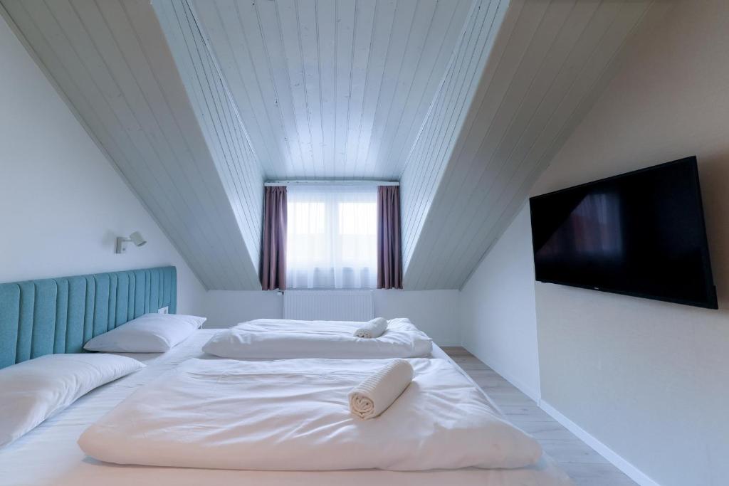 Postel nebo postele na pokoji v ubytování Villa Oliver 2 Hévíz