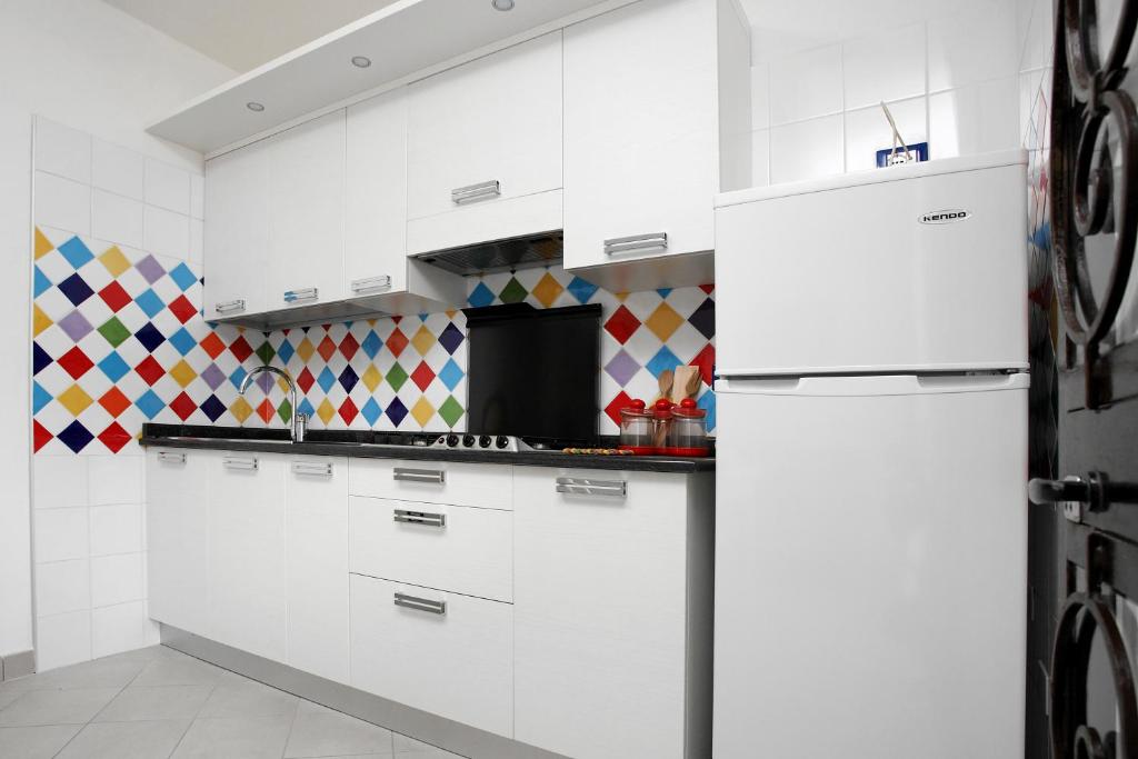 A kitchen or kitchenette at Residence El Patio