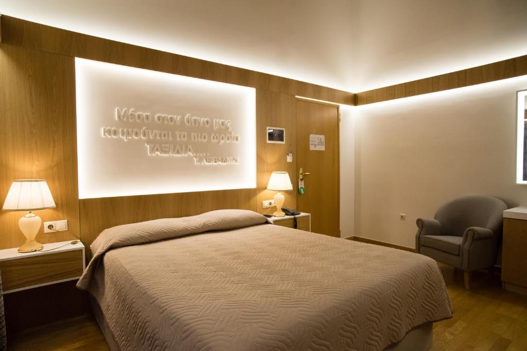Postel nebo postele na pokoji v ubytování Byzantino Hotel