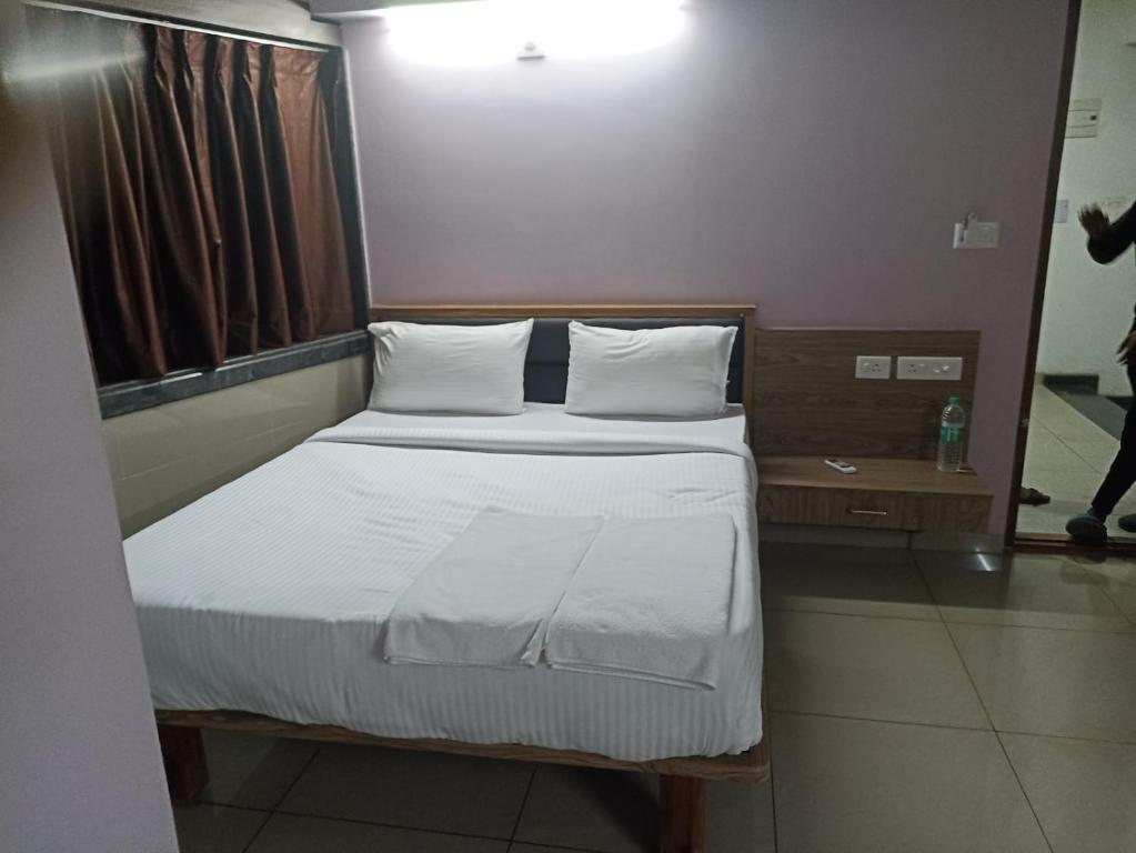 Ένα ή περισσότερα κρεβάτια σε δωμάτιο στο Padilgate Luxuryinn