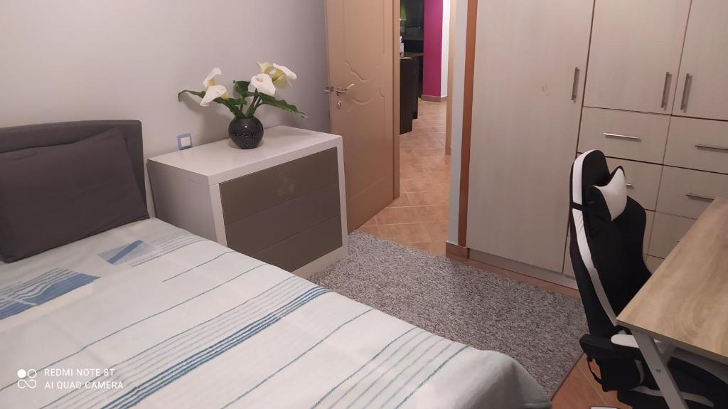 A bed or beds in a room at Theodora's home