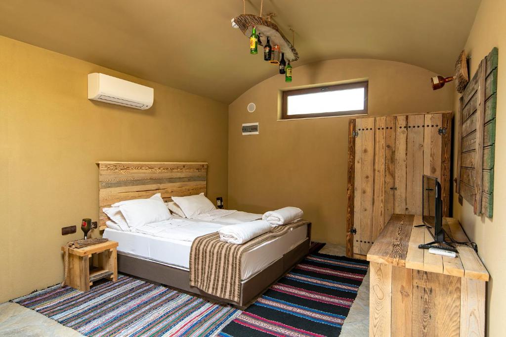 Ένα ή περισσότερα κρεβάτια σε δωμάτιο στο Glamping Alliance Hotel