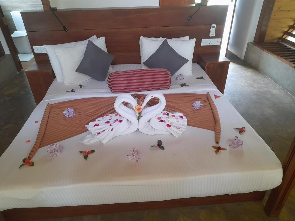 Postel nebo postele na pokoji v ubytování Aloft Grand Hotel Ella