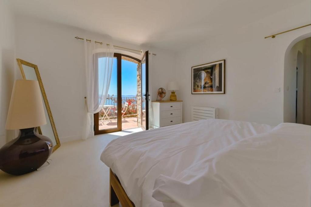 Posteľ alebo postele v izbe v ubytovaní La Villa Deluxe une propriété d'Exception sur les hauteurs d'Ajaccio